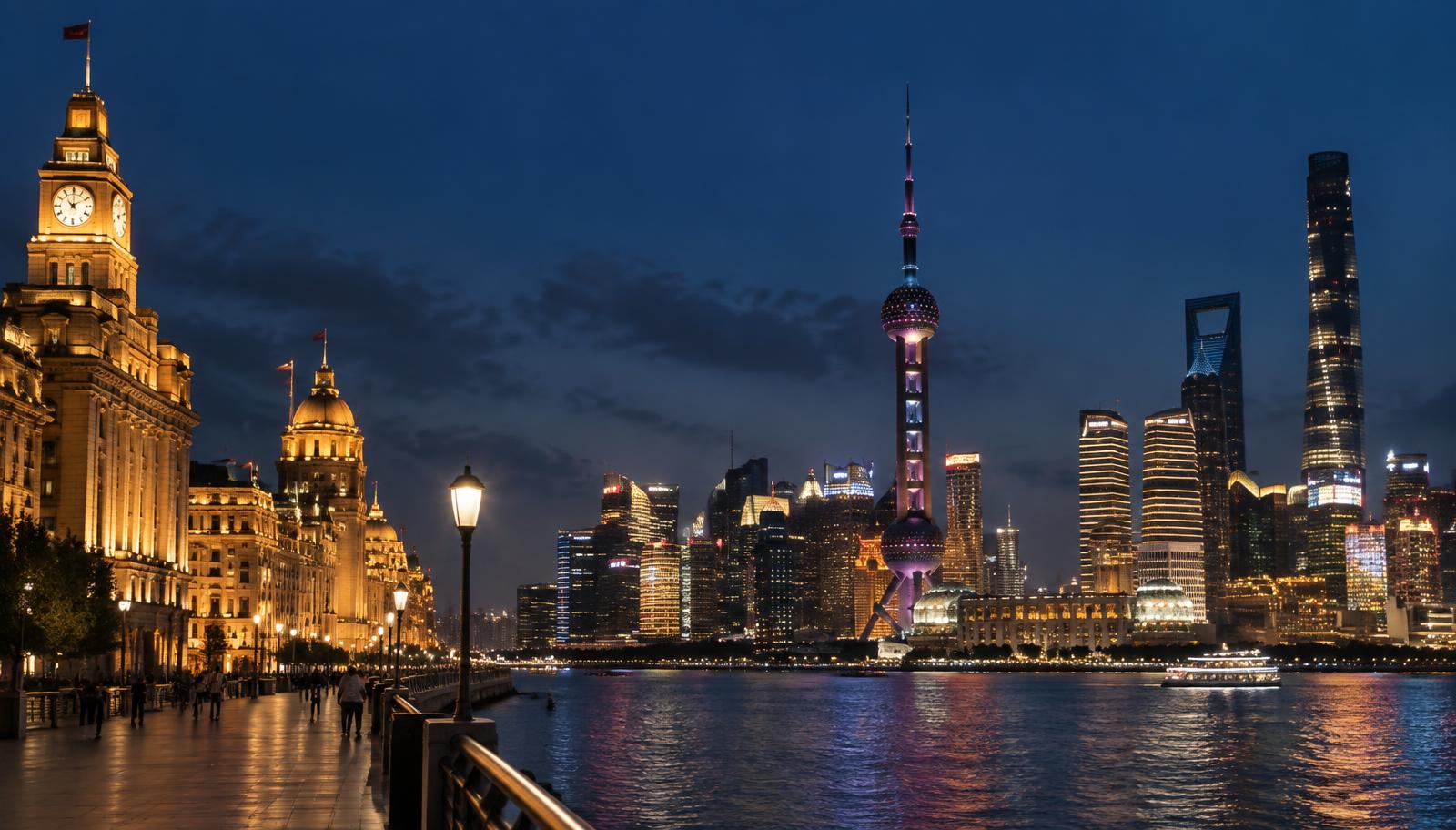Shanghai's riverfront skyline glowing at dusk, seen from the Bund